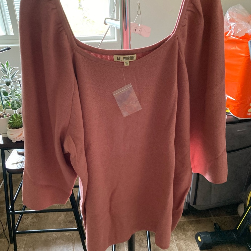 Dusty rose pink blouse.